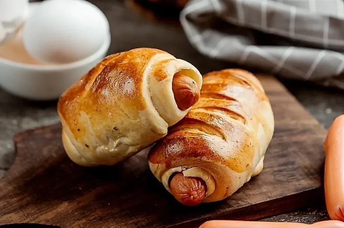 Врач Поляков: сосиски в тесте и беляши повышают риск рака